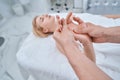 Beauty salon customer receiving a hand massage Royalty Free Stock Photo