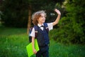 Blonde first-grader goes to school. Royalty Free Stock Photo