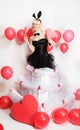 The blonde girl dressed as a playboy Bunny for Valentine's day Royalty Free Stock Photo