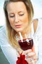 Blonde girl with glass of wine Royalty Free Stock Photo