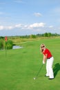 Blonde girl golf player Royalty Free Stock Photo