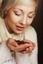 blonde girl hold coffee beans in hands Royalty Free Stock Photo
