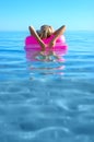 Blonde girl on inflatable raft Royalty Free Stock Photo