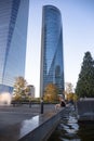 Blonde girl near the Four modern skyscrapers Cuatro Torres in business financial district of Madrid, Spain 2018-08-14