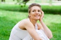 Blonde girl in park doing yoga Royalty Free Stock Photo