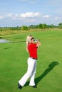 Blonde girl play golf Royalty Free Stock Photo