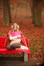 Blonde girl with red book. Royalty Free Stock Photo