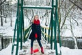 Blonde girl in red scarf on winter day Royalty Free Stock Photo