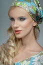 Blonde girl with shawl on head Royalty Free Stock Photo