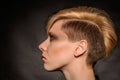 Blonde girl with a short stylish haircut