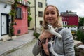 Blonde girl with street cat in Istanbul, Turkey.