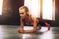 Blonde girl working out at a gym