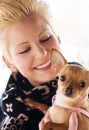 Blonde with her puppy Royalty Free Stock Photo