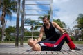 Blonde lady exercising with her personal trainer