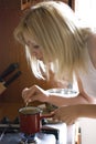 Blonde making coffee Royalty Free Stock Photo