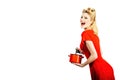 Blonde pin up woman housewife holding pan. Studio shot over white background isolated. Young woman cooking. Portrait of