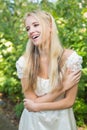 Blonde pretty bride laughing