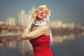 Blonde in a red dress closed her eyes Royalty Free Stock Photo