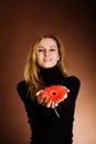 Blonde with a red flower Royalty Free Stock Photo