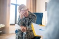 Blonde servicewoman crying while reminding terrible moments