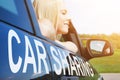 Woman Enjoying Traveling In Car Sharing Service Royalty Free Stock Photo