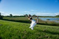 Blonde spiritual woman practicing yoga and doing the king dance standing pulling bow or Natarajasana / Dandayamana Royalty Free Stock Photo