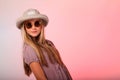 Blonde teenage girl hat and sunglasses Royalty Free Stock Photo