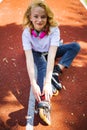 Teenage Girl Wearing Roller Skaters While Standing On The Road In Summe Park. Royalty Free Stock Photo