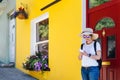 Blonde Traveler Ready to Explore the World: Chirpy, Chic and Charismatic at Yellow House with Mobile Chatting