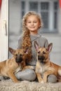 Blonde with two puppies mongrels Royalty Free Stock Photo
