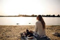 Blonde Woman On The Beach With Kitten Royalty Free Stock Photo