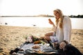 Blonde Woman On The Beach With Kitten Royalty Free Stock Photo