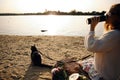 Blonde Woman On The Beach, Picnic With Kitten Royalty Free Stock Photo