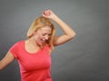 Blonde woman being happy, dancing out of joy Royalty Free Stock Photo