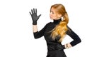 Woman in dark clothing of a beauty salon employee and black latex gloves