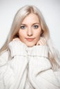 Blonde woman in cashmere sweater Royalty Free Stock Photo