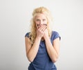 Woman covering her face with both arms Royalty Free Stock Photo