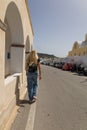 blonde woman exploring santorini greece Royalty Free Stock Photo