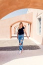 blonde woman exploring santorini greece Royalty Free Stock Photo