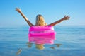 Blonde woman with inflatable raft Royalty Free Stock Photo