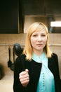 Blonde woman in the kitchen