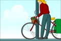 Blonde woman locking bike post