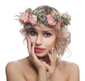 Blonde woman model with make up, short curly hair and flowers isolated on white Royalty Free Stock Photo