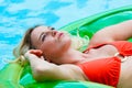 Blonde woman in pool