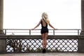 Blonde woman posing back, legs. Royalty Free Stock Photo