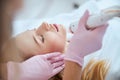 Blonde woman receiving the fractional microneedling treatment Royalty Free Stock Photo