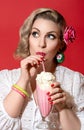 Woman drinking milkshake. Portrait of a retro style woman Royalty Free Stock Photo