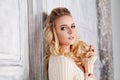 Blonde Woman seducing in Vintage Interior Royalty Free Stock Photo