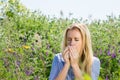 Blonde woman suffering from allergies Royalty Free Stock Photo