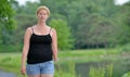 Blonde woman on a summer stroll